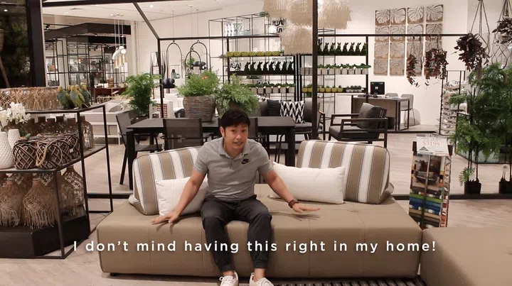 young sitting on beige outdoor chair