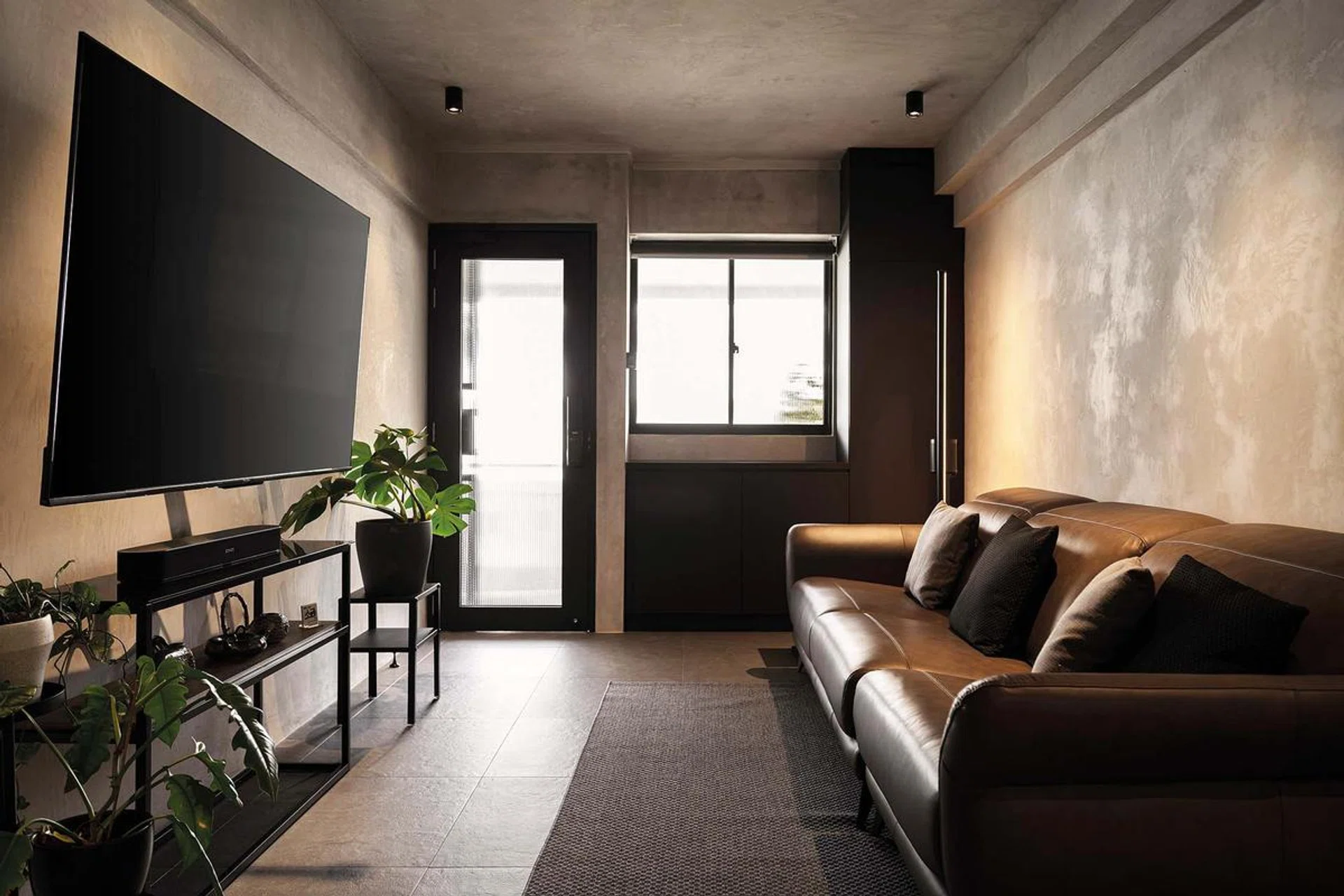 A wall separating the living room from the kitchen was hacked to create an open-concept kitchen.