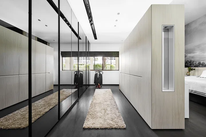 Walk-in wardrobe after renovation in a 3-bedroom condo in East Coast.