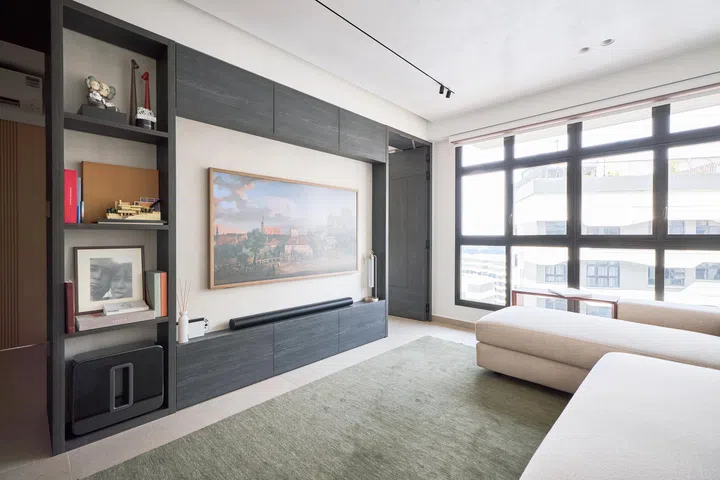 Living room in a couple’s 4-room BTO (1,001 sq ft) in Punggol.