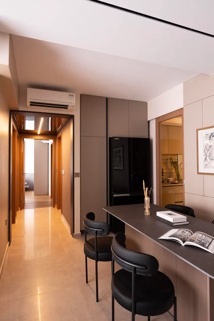 The bar-meets-dining area. The corridor leads to the master. 