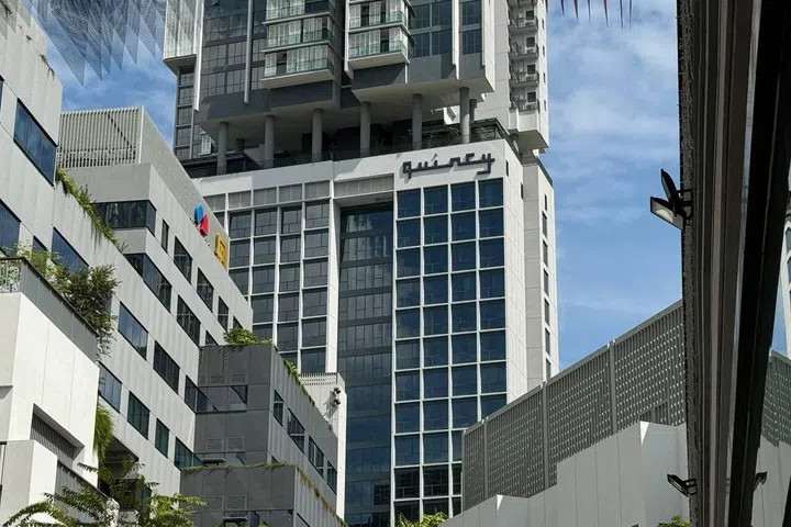 Exterior view of Quincy House from One Holland Village.