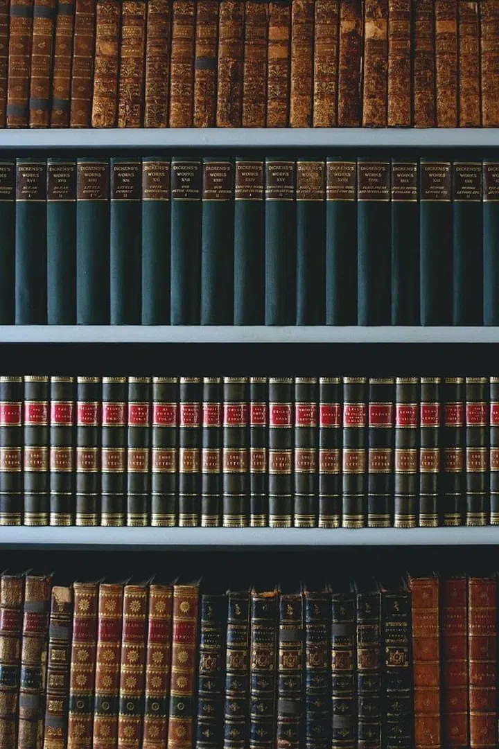 Arranging your books by colour is an easy way to get that bookshelf looking great. For visual thinkers, organising your books by colour might be the easiest way to find what you're looking for, too. Photo: Pixabay