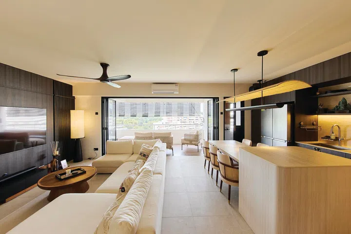 Open-concept living and dining room in a 3-bedroom condo (1,800 sq ft) in Pandan Valley, designed by Insight.Out Studio.