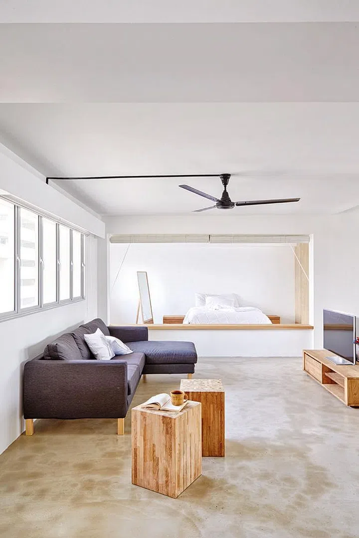 The open concept in this Jumbo HDB (3-room and 4-room merged) was taken to the extreme in this abode. Even the sole bedroom was left without any doors or walls to fully enclose it. The closest thing to privacy for the room is achieved with bamboo blinds. Renovation cost $64,000 excluding furniture.