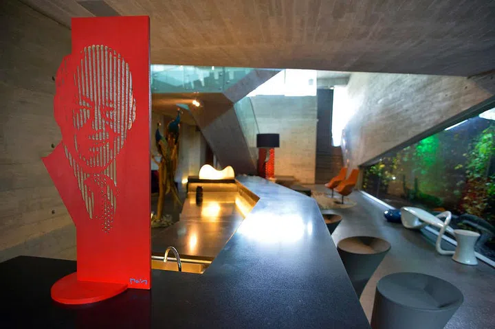 Art piece with Singapore’s founding Prime Minister Lee Kuan Yew portrait imprinted, purchased at a charity event.