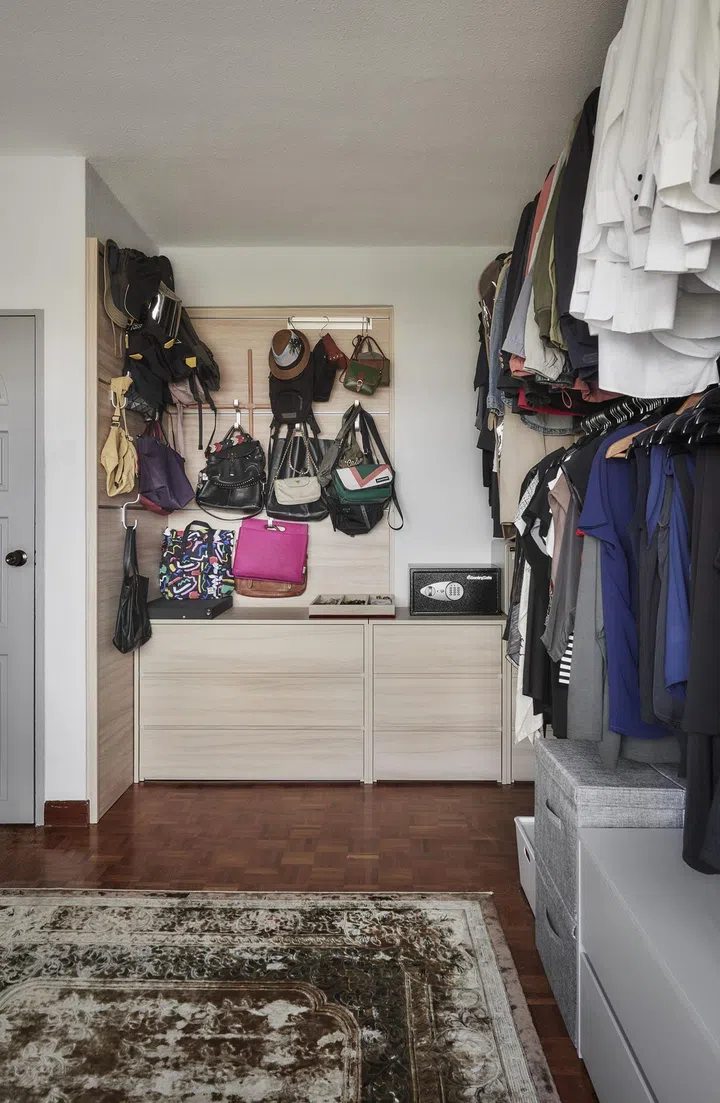 Walk in wardrobe in a 1,650 sq ft 3-bedroom Marine Parade condo.