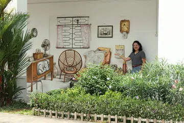 Homeowner Jess showing us one of the two main murals in the Tiong Bahru neighbourhood.