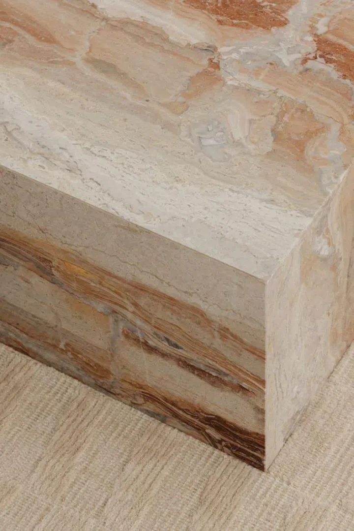 Lim is drawn toward natural materials, such as the marble of the bespoke coffee table in the living room. (Photo: Studio Periphery)