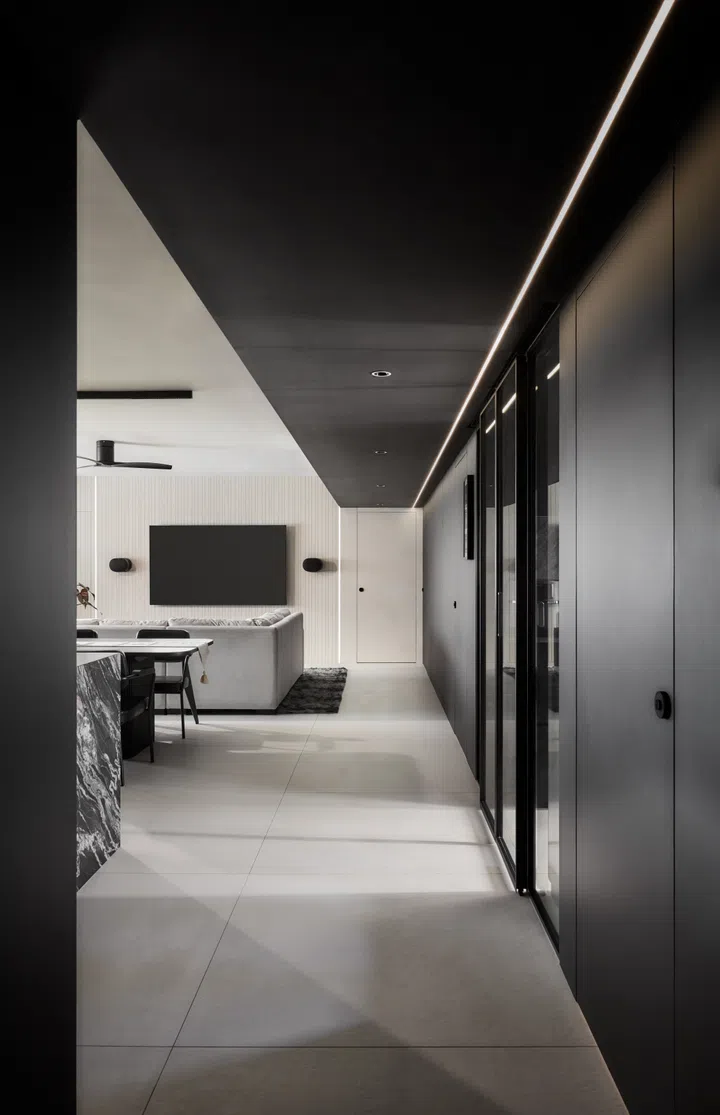 The huge living room, dining area and dry kitchen lead seamlessly into each other. Image by Third Avenue Studios.