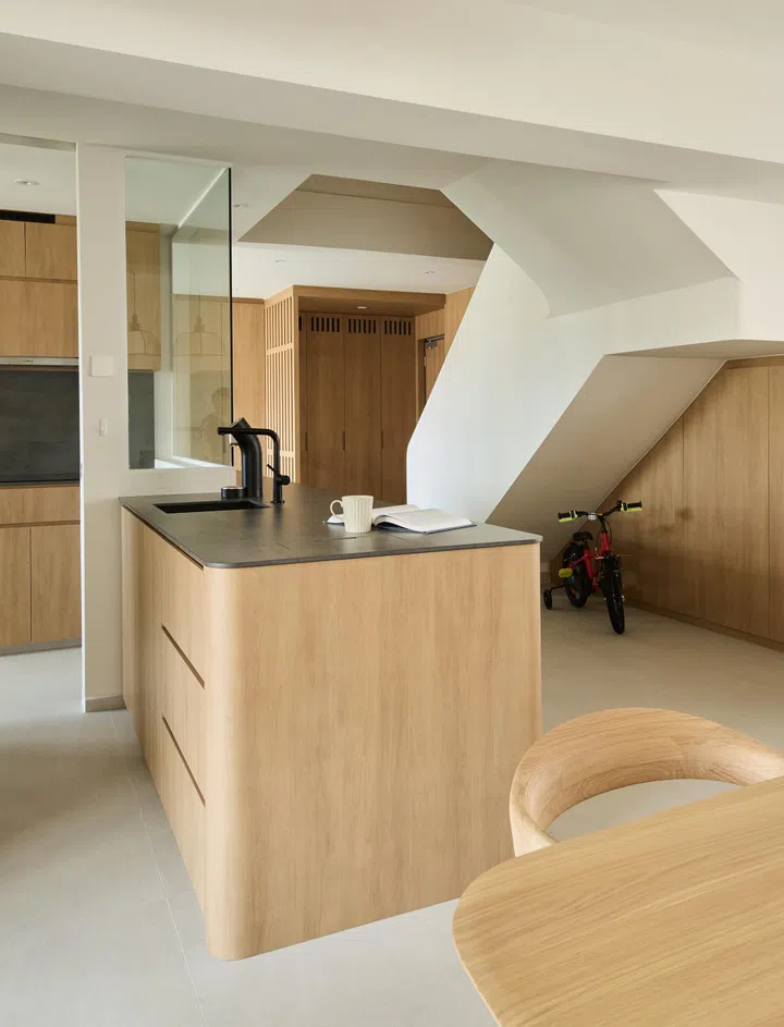 The sun-kissed balcony converted into extra seating, including storage beneath. 