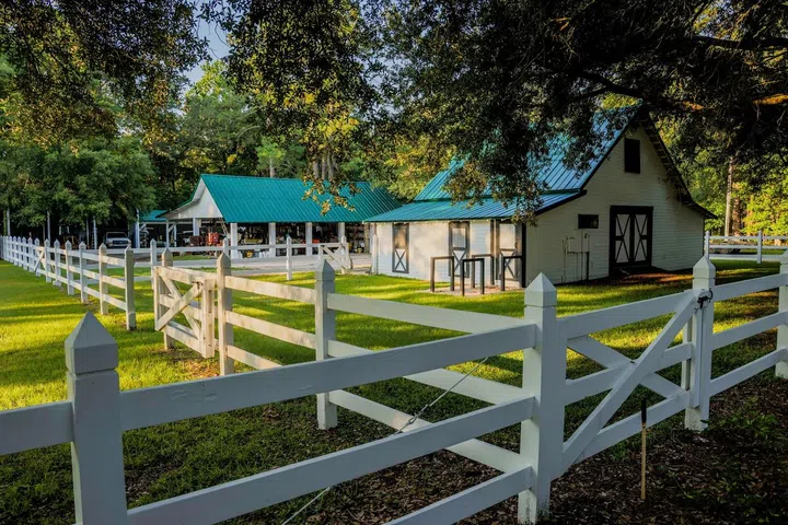 The estate includes an impressive array of additional buildings.