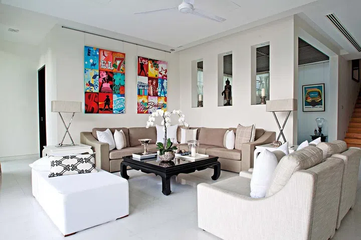 Before: With its generic layout and choice of furniture, the main living room lacked focus and seemed drained of vitality. The new look is instantly engaging and empowering, making you feel energised.