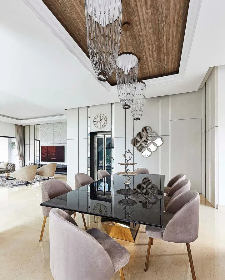 A luxurious modern contemporary dining room in this 4-storey terrace house in Telok Kurau.