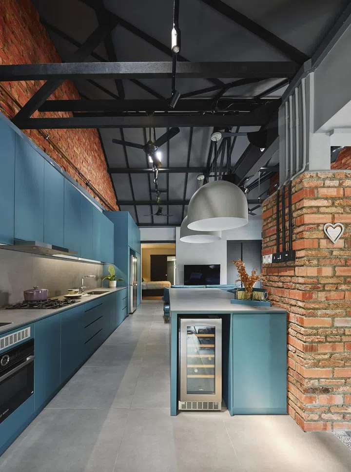 Open concept kitchen was one of the homeowner's interior design requests for their 1,189 sq ft single-storey corner terrace house in Siglap.