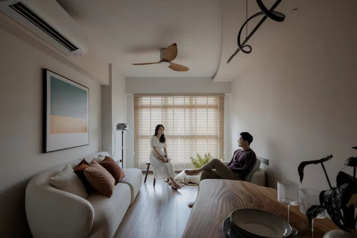 Homeowners Denise and Dylan in their living room. 