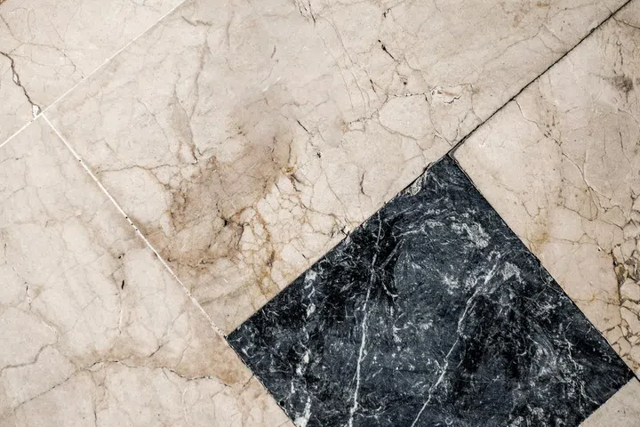 Diagonally beautifully arranged marble floor tiles.