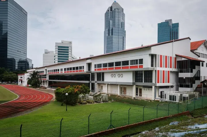 The main block of the former St Andrew’s Junior College campus in Malan Road overlooks the school’s track.