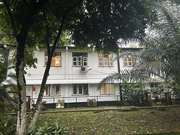 Lights on as residents prepare to leave for work in the early morning at Jalan Hang Jebat's SLA rental houses.