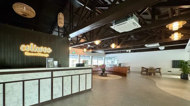 Coliwoo Resort Changi main reception area with seating and co-working areas.