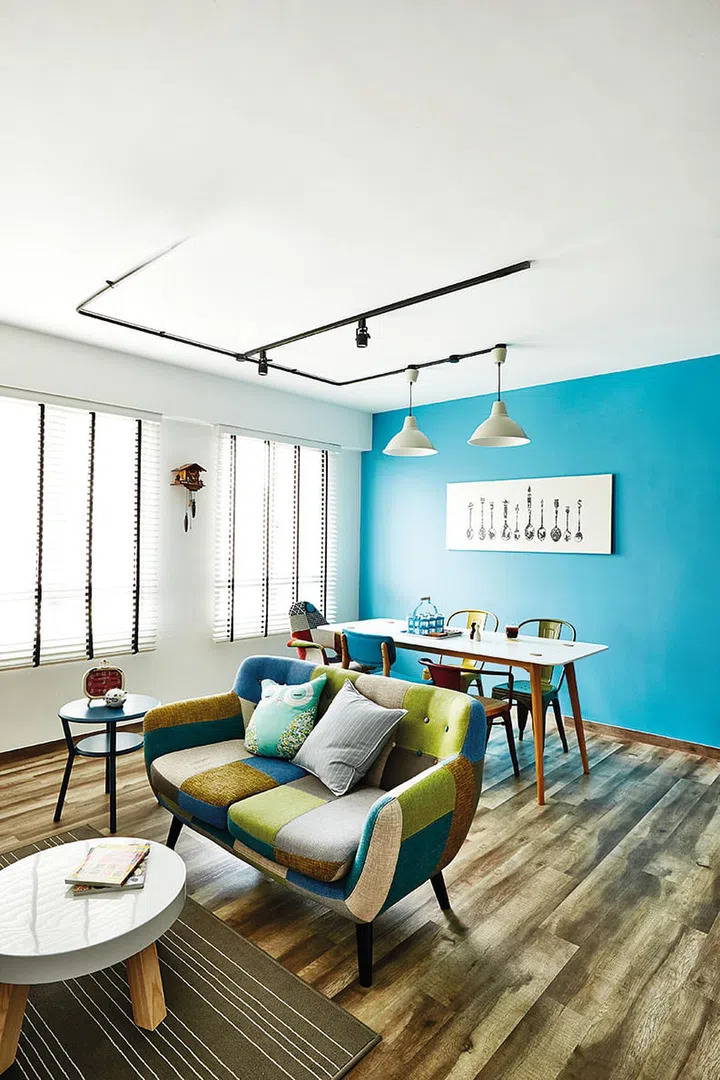 The slanted legs of the furnishings give them a rather offbeat vibe that matches the cheery, funky apartment.