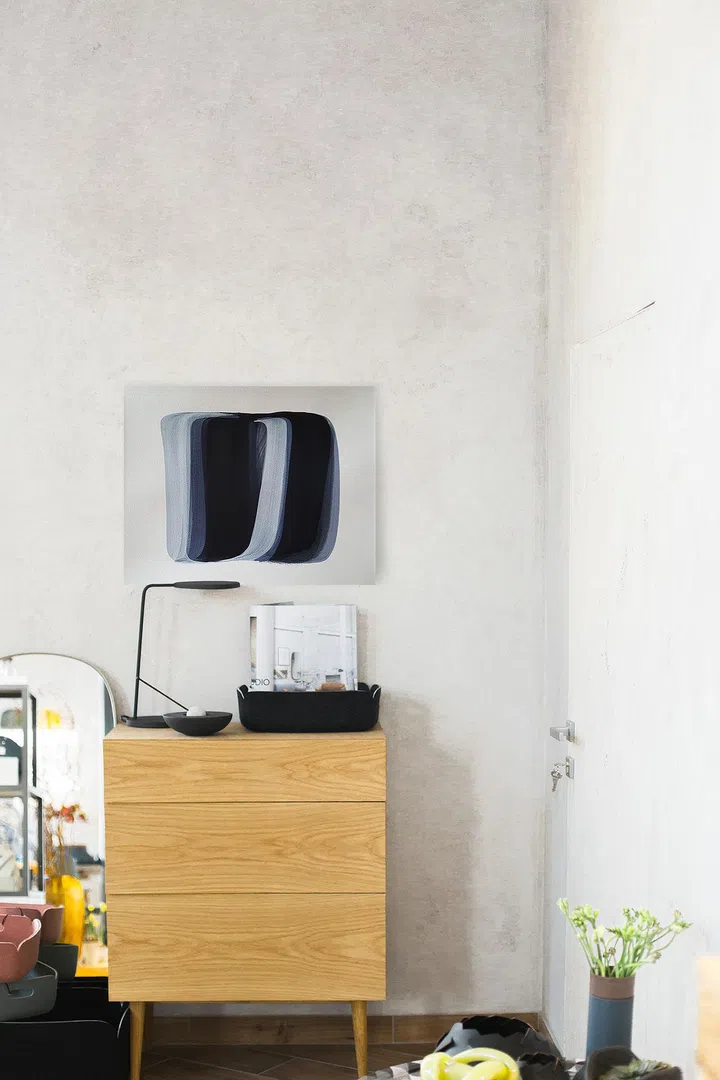 Artwork 'V-bwcs2' by artist Seungyean Cho hanging on the wall above a bedside drawer console unit.
