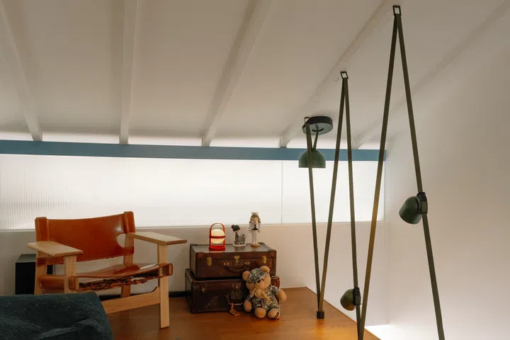 Rather than creating another enclosed room, the loft was designed as a flexible retreat for reading and relaxing.