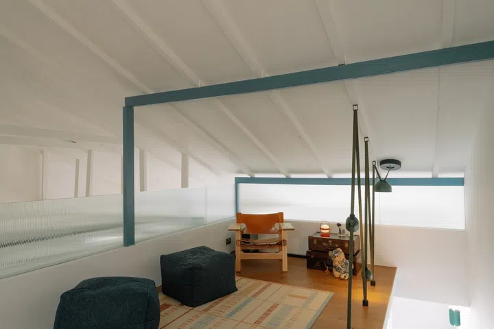 Beanbags, lounge seating and an open layout make the loft an inviting space for gathering with friends over drinks and music.