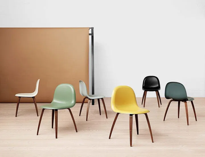 Gubi 5 chair by Komplot Design, 2003, from left: White cloud, mistletoe green, nightfall blue, venetian gold, black and rainy grey