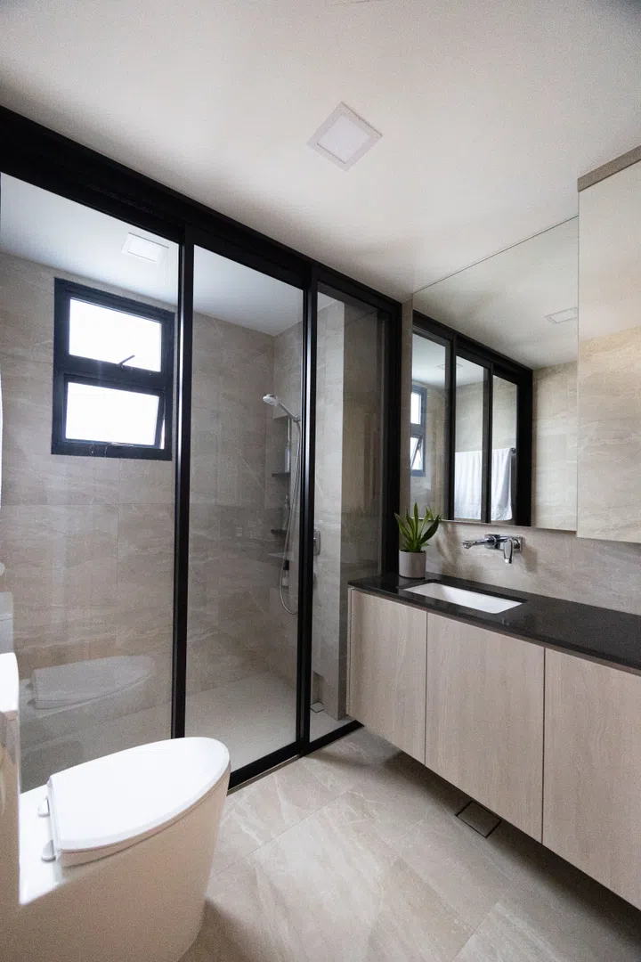 A sleek, modern bathroom with clean lines and an open layout, designed for both style and function.