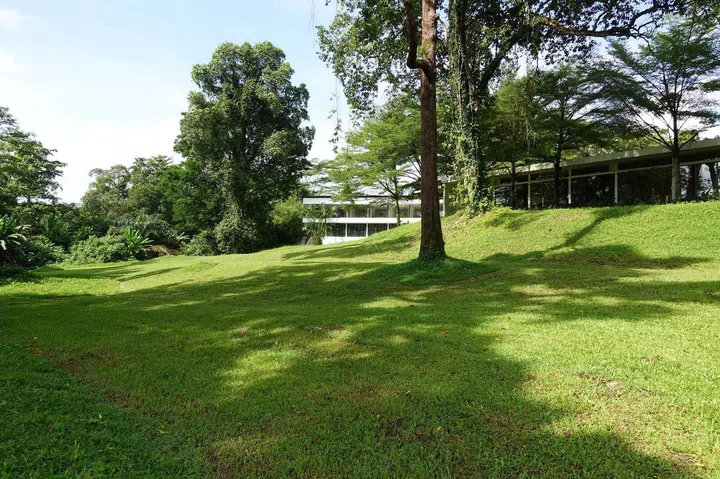 The CSC Dempsey Clubhouse before redevelopment was hidden and inaccessible behind uneven terrain. Image Credit: AIR CCCC