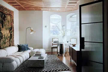 Rug by Crystal Sinclair Designs, with Chairish floor lamp and vintage tapestry.. An Emmy-Award producer's New York City Victorian home built in 1888