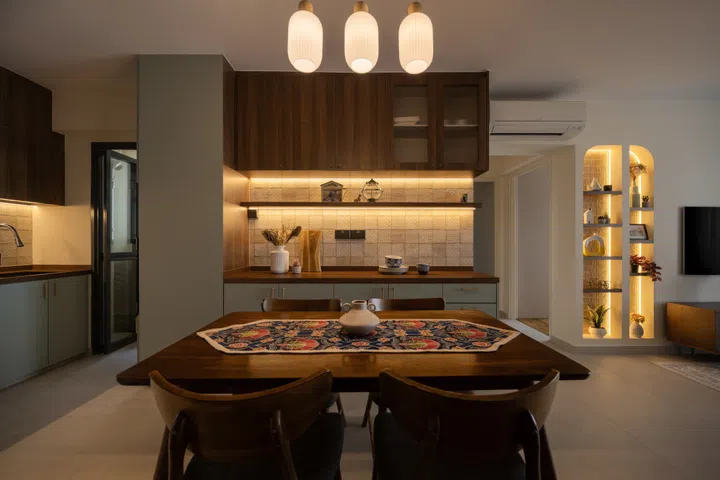 Warm wood tones and soft lighting make this dining spot feel like an everyday retreat. Image from Studio L’arc.