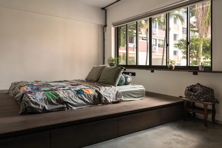 A custom bed with storage was built by the design team. 