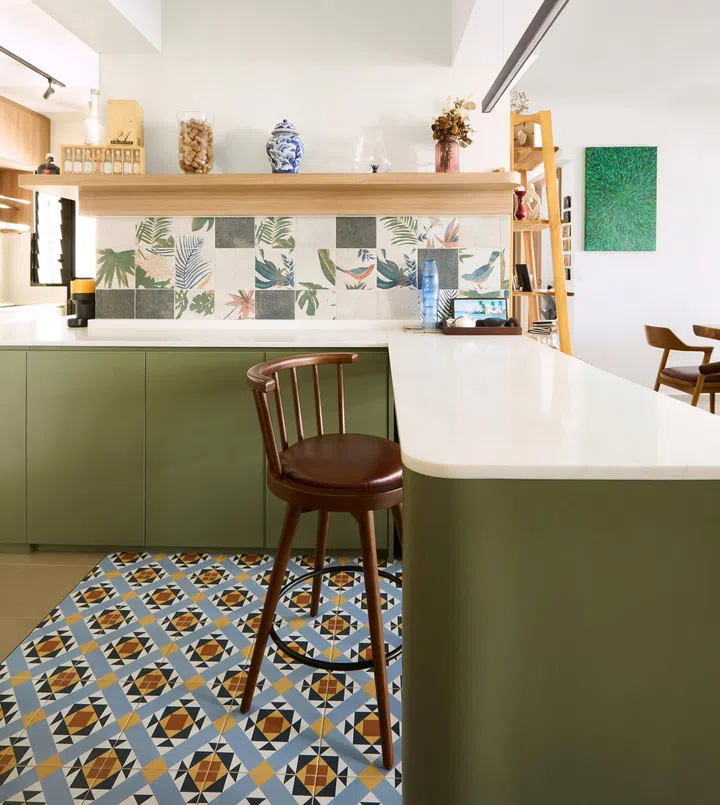 The kitchen features patterned tiles that give it a calming yet fun ambiance. 