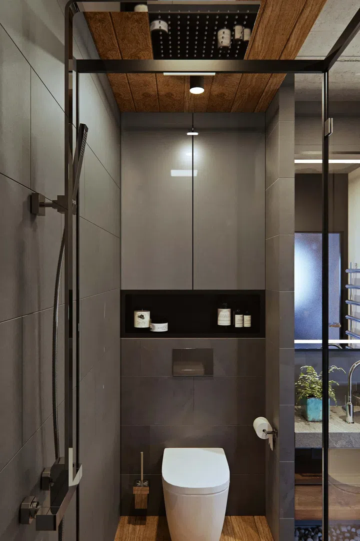 The bathroom is clad in grey.