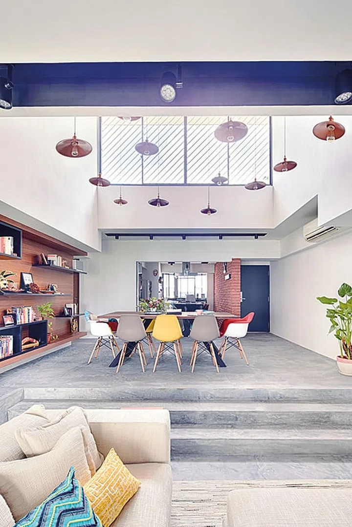 The living space is generously illuminated by natural light. If it gets too warm, the couple can lower the motorised blinds installed by 51 Curtains.