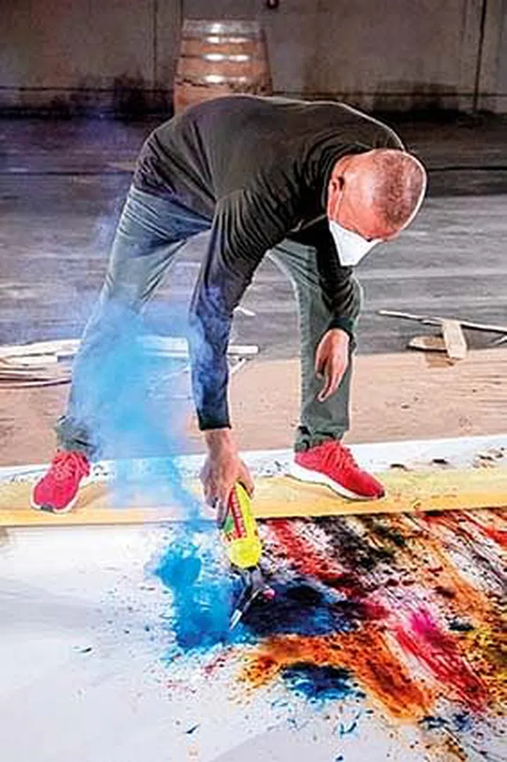 COGNAC, FRANCE - SEPTEMBER 25: In this handout image provided by Hennessy, artist Cai Guo-Qiang creates “Color Gunpowder Drawing for The Birth of Tragedy: Daytime Explosion Event for 2020” on September 25th, 2020 in Cognac, France. The artwork is realized with the precious support of Hennessy, “The Odyssey of Life: Celebration of the 150th Anniversary of Hennessy X.O.”