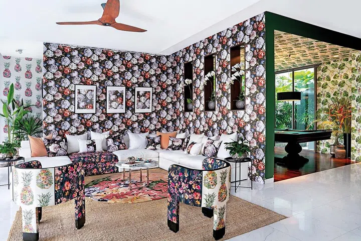 Main living room after redecorating with floral wallpapers.