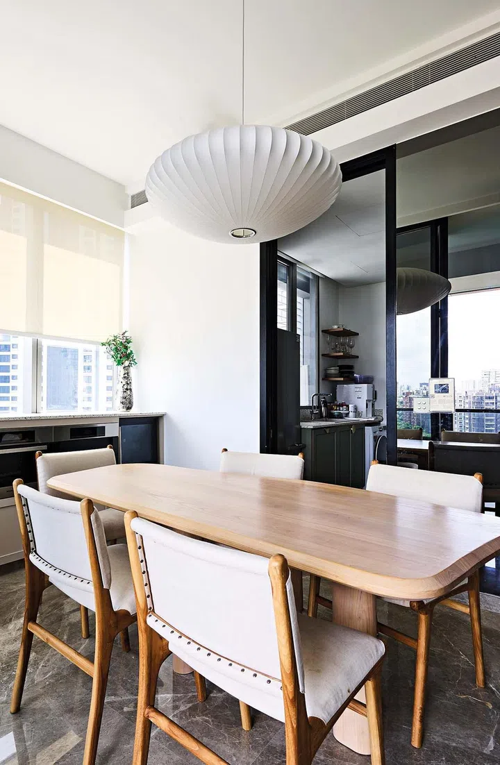 The dining table and chairs were custom-made by Second Charm and The Grey House respectively based on images of a design that Clara liked.