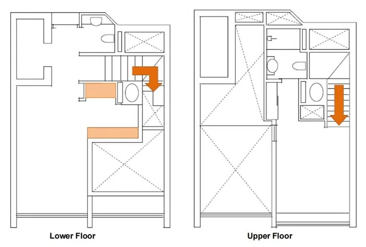 The compact loft is organised across two levels, with the living room occupying the double-volume space below and the bedroom tucked above on the mezzanine level.