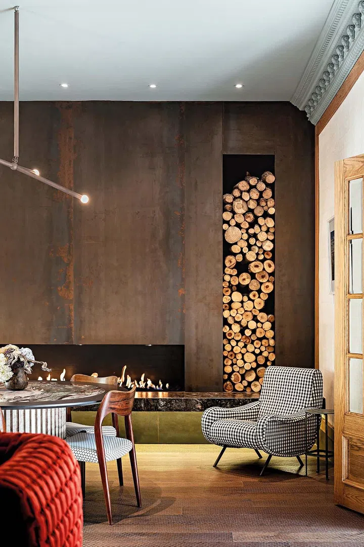 The fireplace creates a cosy ambience.