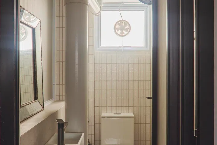 A shower and sink were added to the second bathroom, one of the few layout changes made during the renovation.