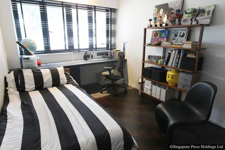 An S-shaped Panton chair in a bedroom of adman Jeff Cheong's three-storey house in Telok Kurau Road.