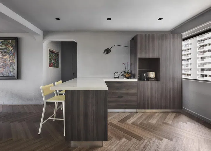 Kitchen island and dry kitchen in a 1,650 sq ft 3-bedroom Marine Parade condo.