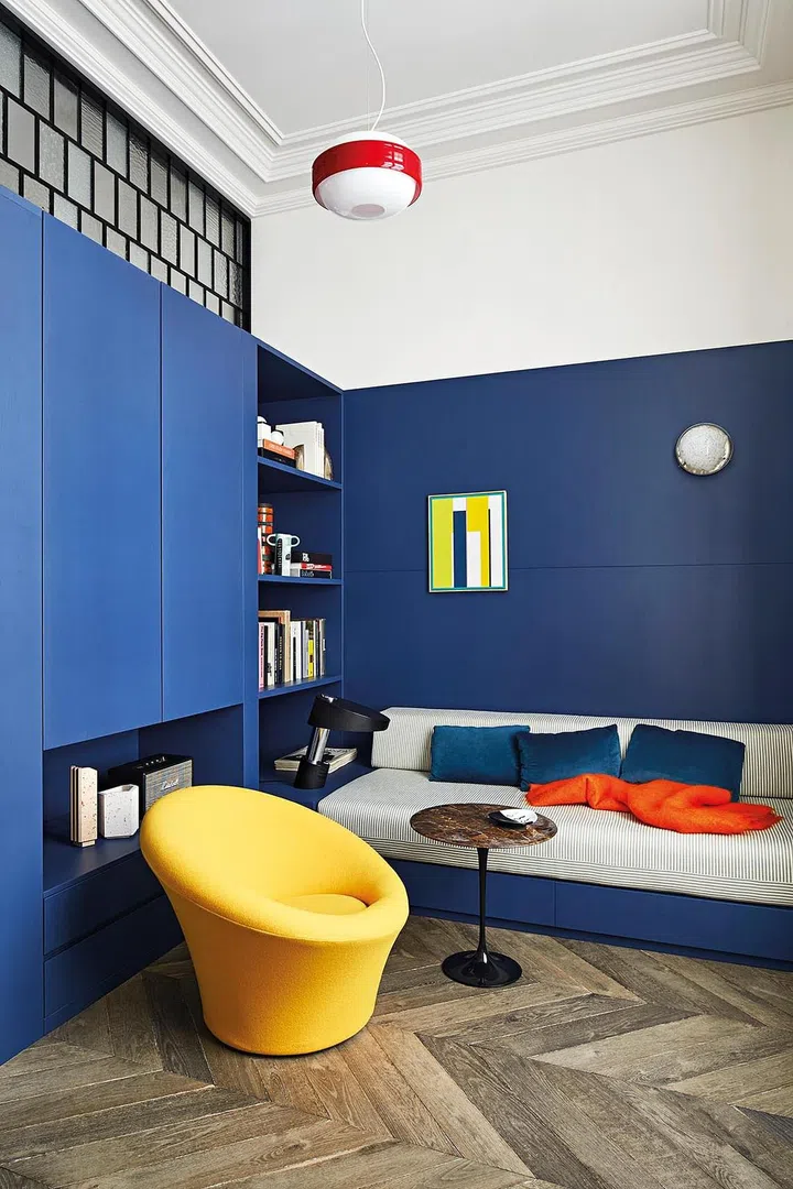 The selective incorporation of colour to certain spaces creates visual interest.