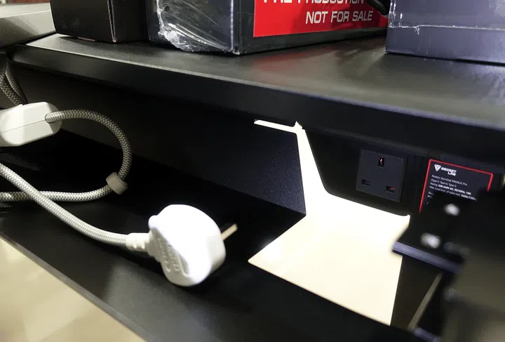 The Secretlab Magnus Pro's 11.5cm hinged cover for cables at the back comes with warning sign against placing any substantial load on the hinged rear cover. Photo from Hardwarezone