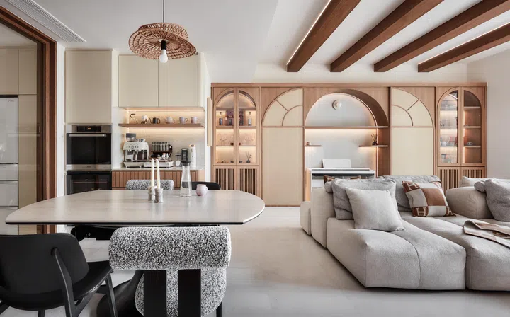 Sliding rattan panels reveal a built-in piano alcove—a favourite feature that the couple keep hidden until guests arrive.