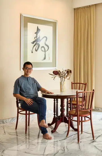 40-Year-old Alec Liong, Corporate Manager and Legal Counsel of Matsushita Greatwall Corporation poses for a photo in his family home.