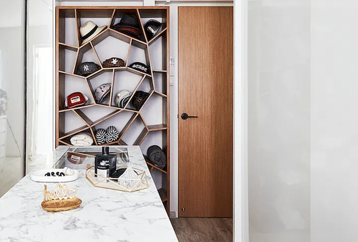 Interior designer Ivan decided to transform one of the bedrooms into a complete wardrobe space with sliding doors to keep the space looking clutter-free.